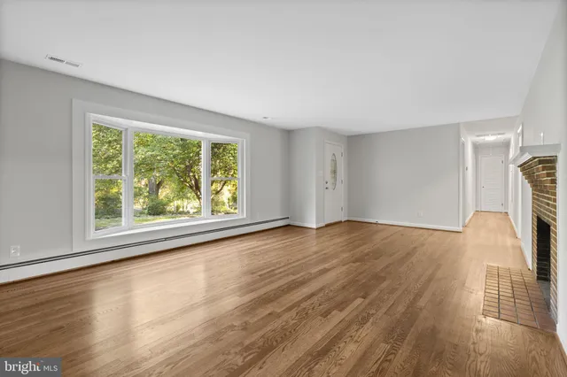 a kitchen with stainless steel appliances granite countertop a stove and a refrigerator