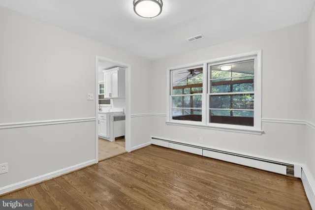 a kitchen with stainless steel appliances granite countertop a refrigerator sink and cabinets