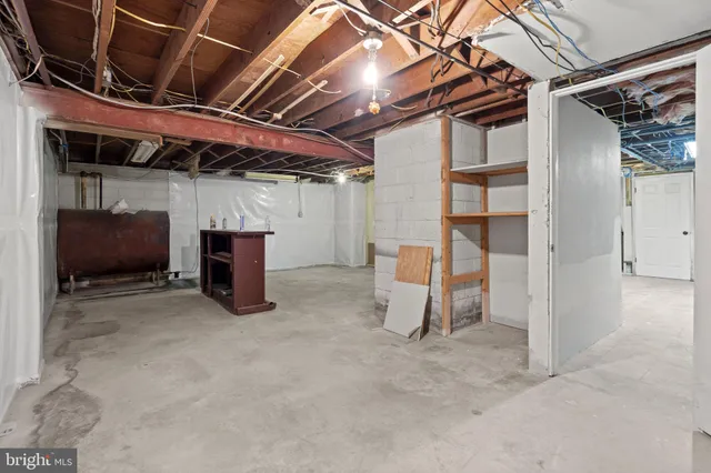 a view of a backyard with sitting area