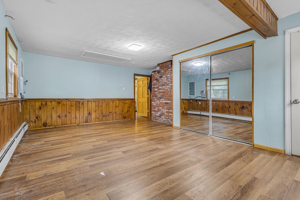 21 Annette Road Brockton, MA 02302 - Photo 18 of 29 wooden floor with an empty room