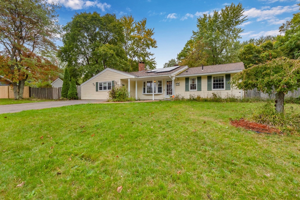21 Annette Road Brockton, MA 02302 - Photo 3 of 29 a front view of a house with a garden