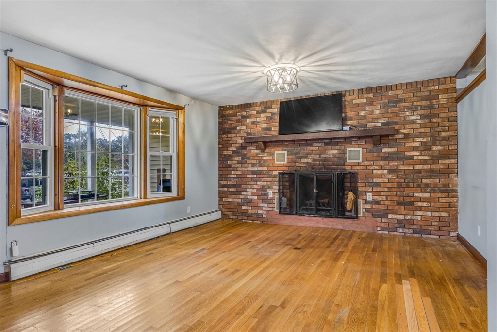 21 Annette Road Brockton, MA 02302 - Photo 9 of 29 a view of a livingroom with a fireplace