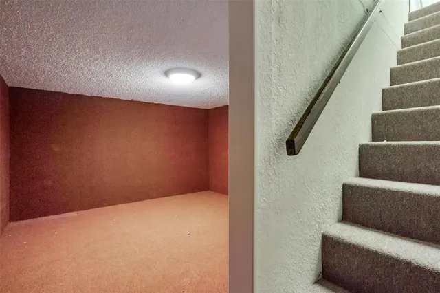 a view of livingroom with furniture and stairs
