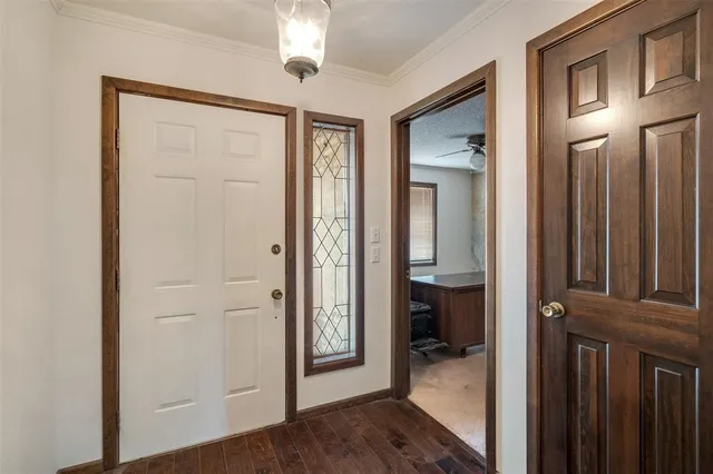 a view of a room that has a mirror in it