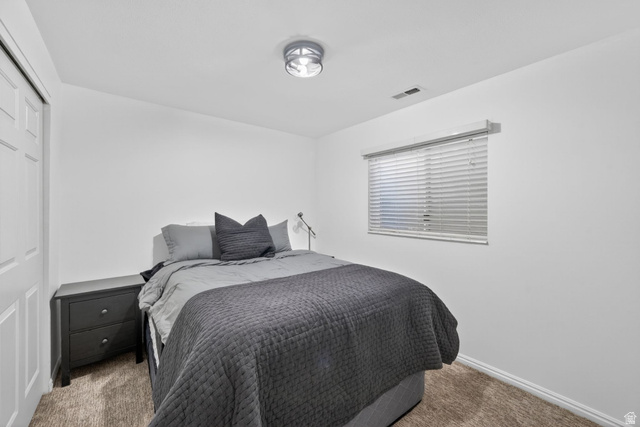 788 East Gables Street Midvale, UT 84047 - Photo 14 of 24 Interior room featuring clean white walls, a single window with blinds, and light brown carpeting