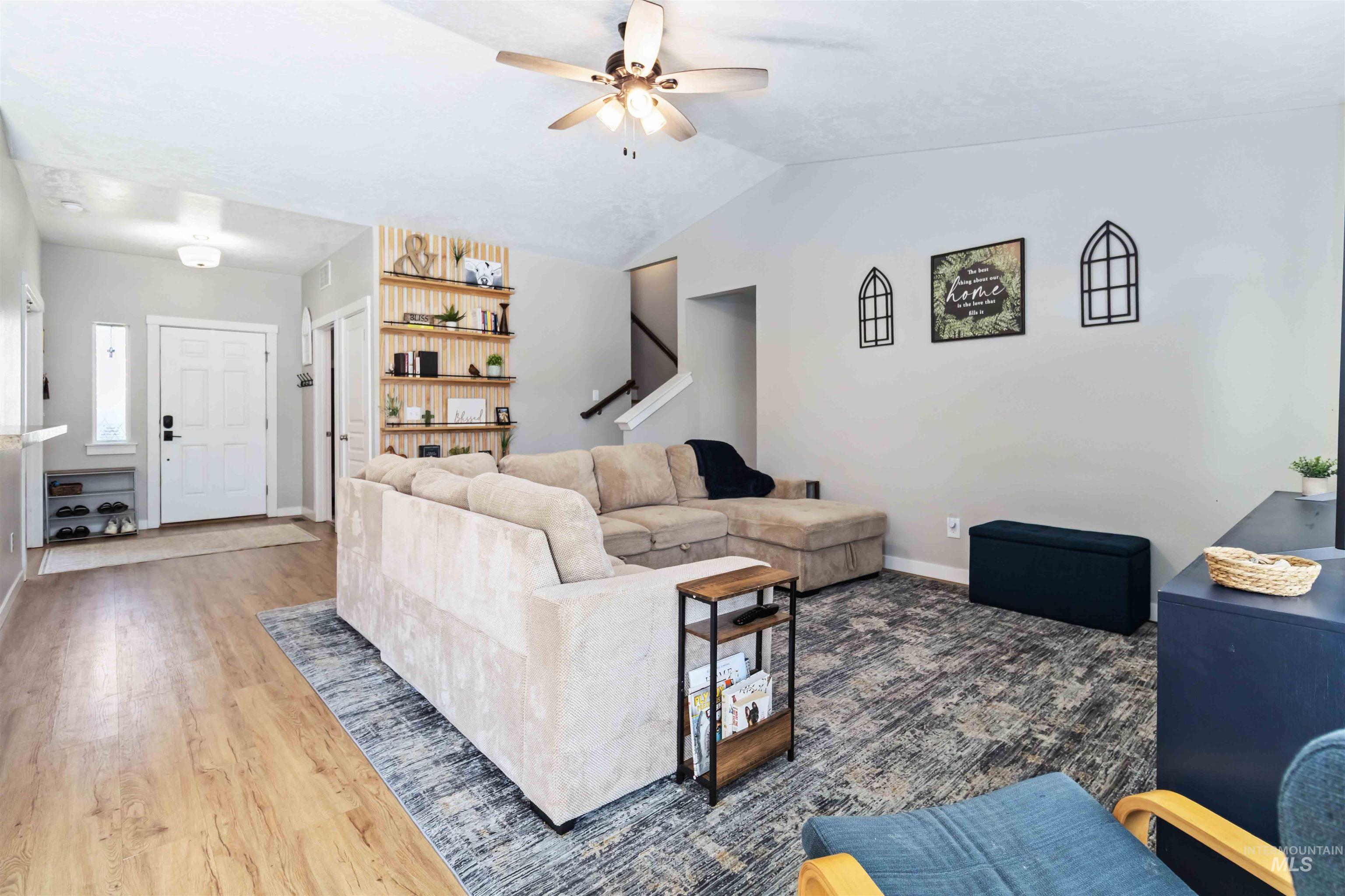 588 Gateway Avenue Middleton, ID 83644 - Photo 12 of 42 Living area featuring ceiling fan and wood finished floors