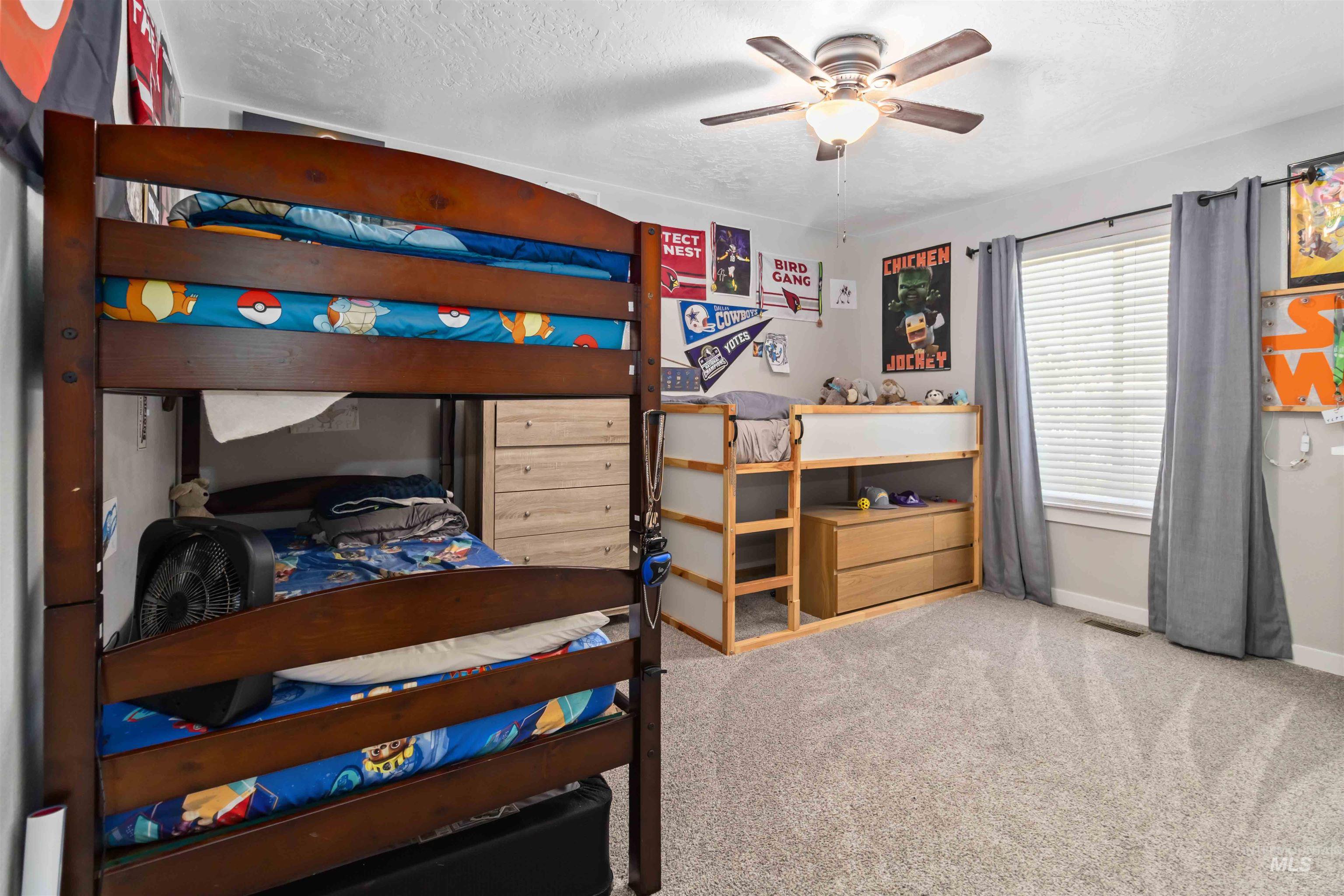 588 Gateway Avenue Middleton, ID 83644 - Photo 22 of 42 Bedroom featuring a textured ceiling, light colored carpet, and ceiling fan