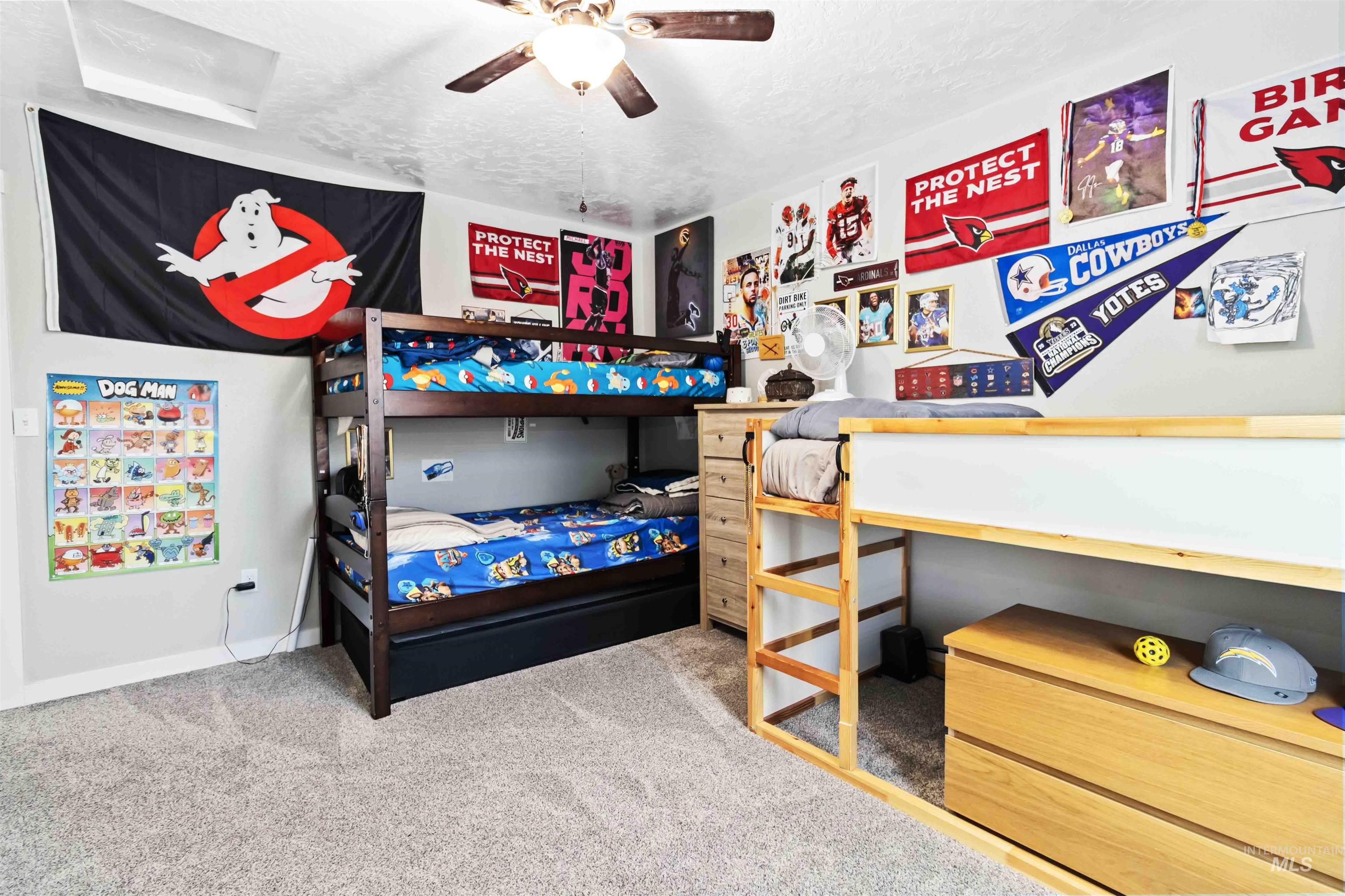 588 Gateway Avenue Middleton, ID 83644 - Photo 23 of 42 Bedroom featuring light colored carpet, a ceiling fan, and a textured ceiling