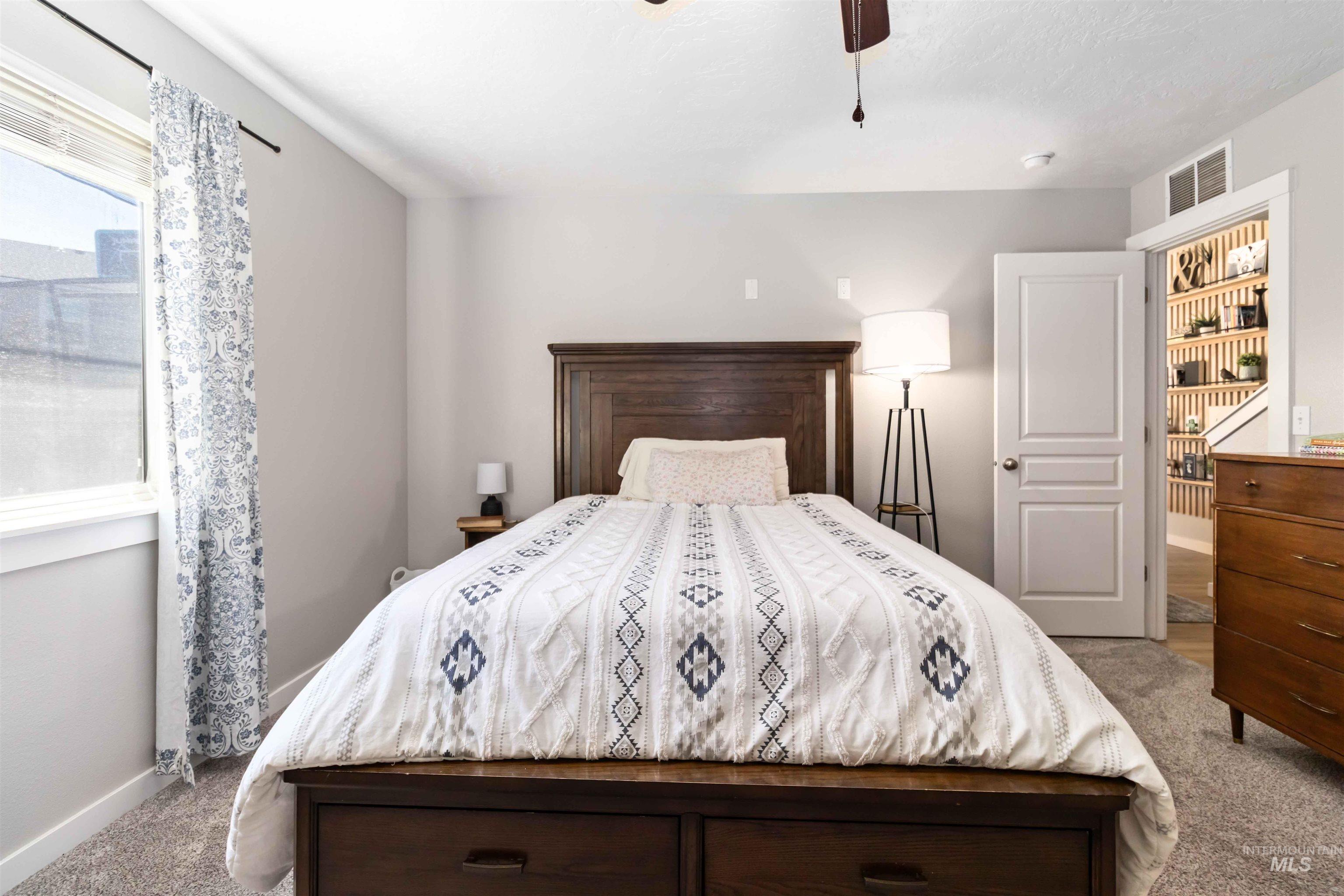 588 Gateway Avenue Middleton, ID 83644 - Photo 30 of 42 Bedroom featuring carpet floors and a ceiling fan