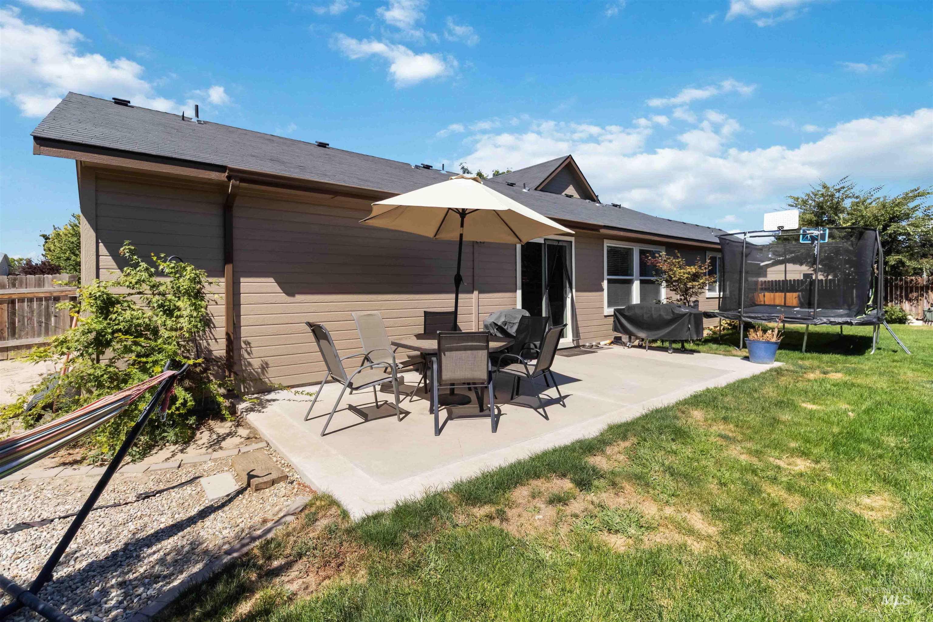 588 Gateway Avenue Middleton, ID 83644 - Photo 41 of 42 Back of house with a trampoline and a patio