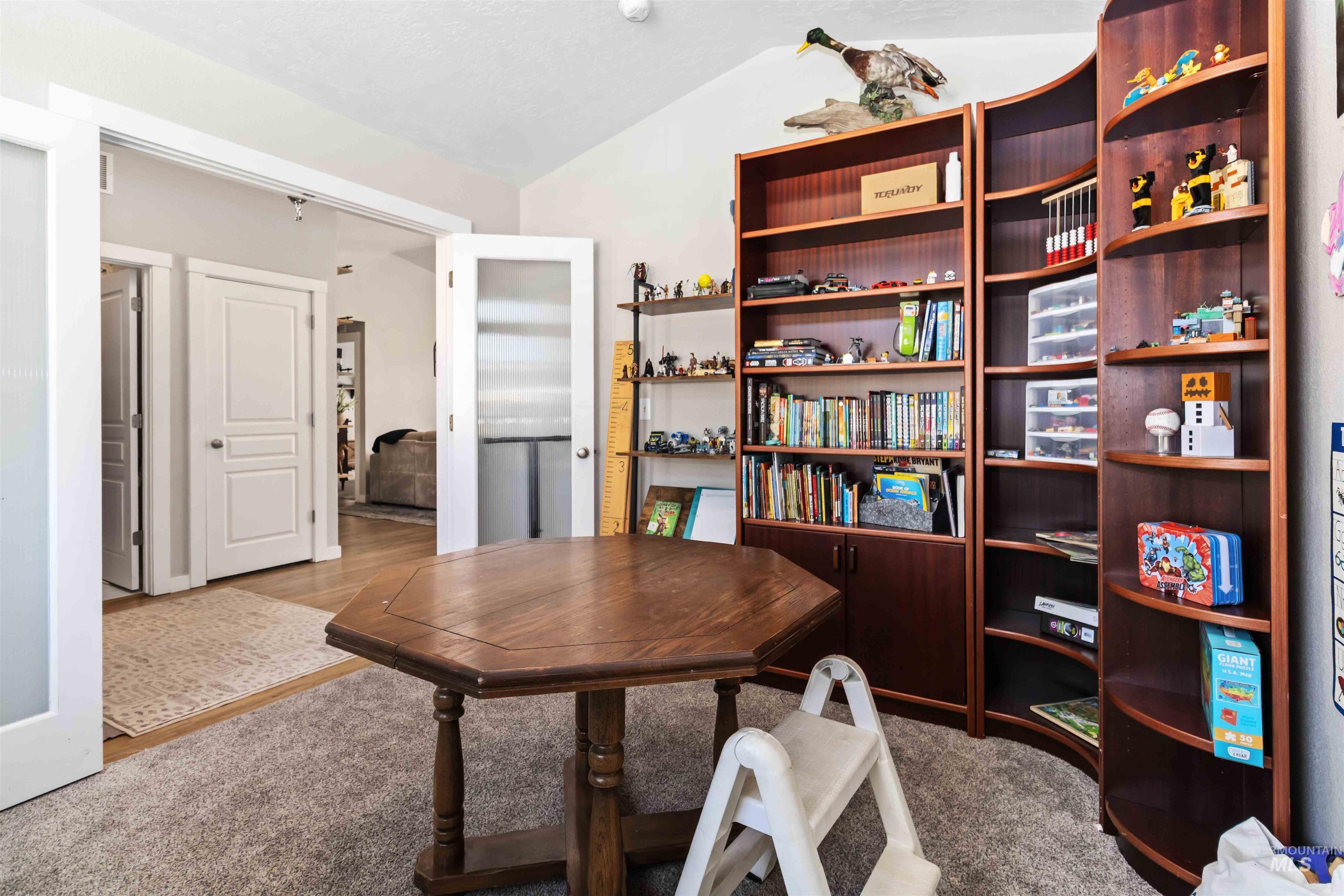 588 Gateway Avenue Middleton, ID 83644 - Photo 9 of 42 Carpeted office space with lofted ceiling