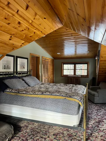 a view of spacious bathroom with a granite countertop sink