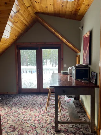 a room with furniture and a window