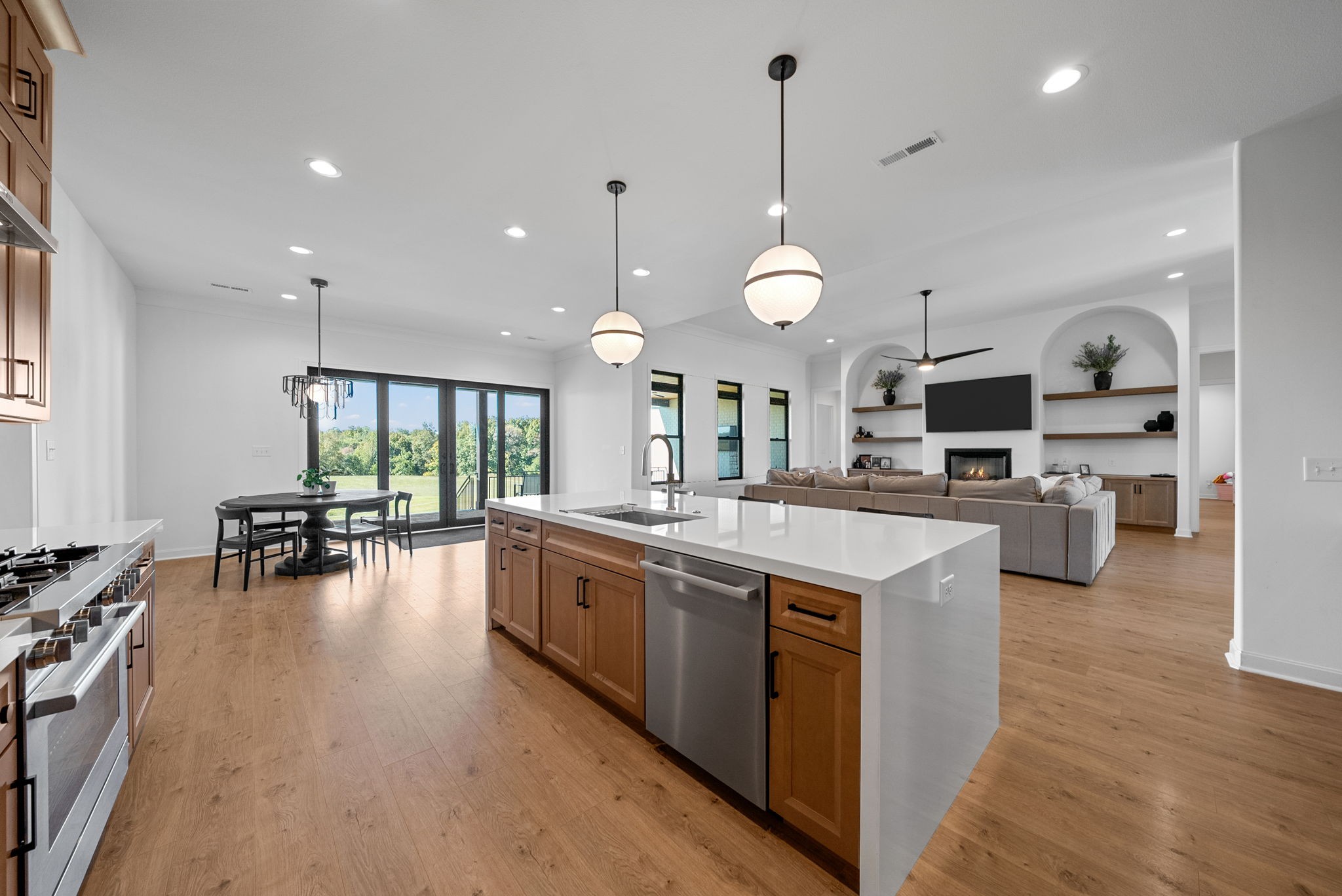 1914 Hickory Point Road Clarksville, TN 37043 - Photo 17 of 38 a kitchen with lots of counter top space a sink appliances and living room view