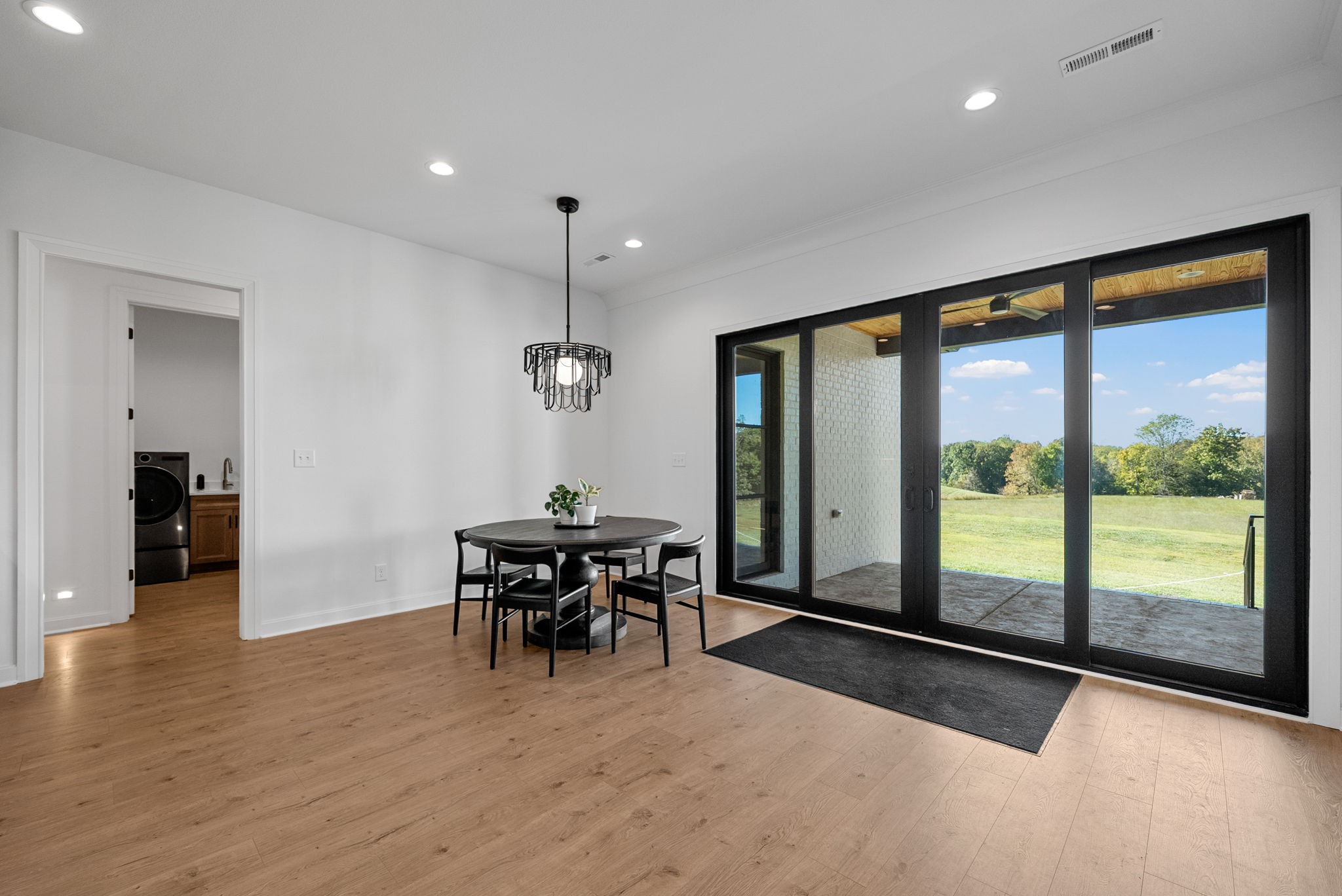 1914 Hickory Point Road Clarksville, TN 37043 - Photo 19 of 38 a view of a dining room with furniture window and wooden floor