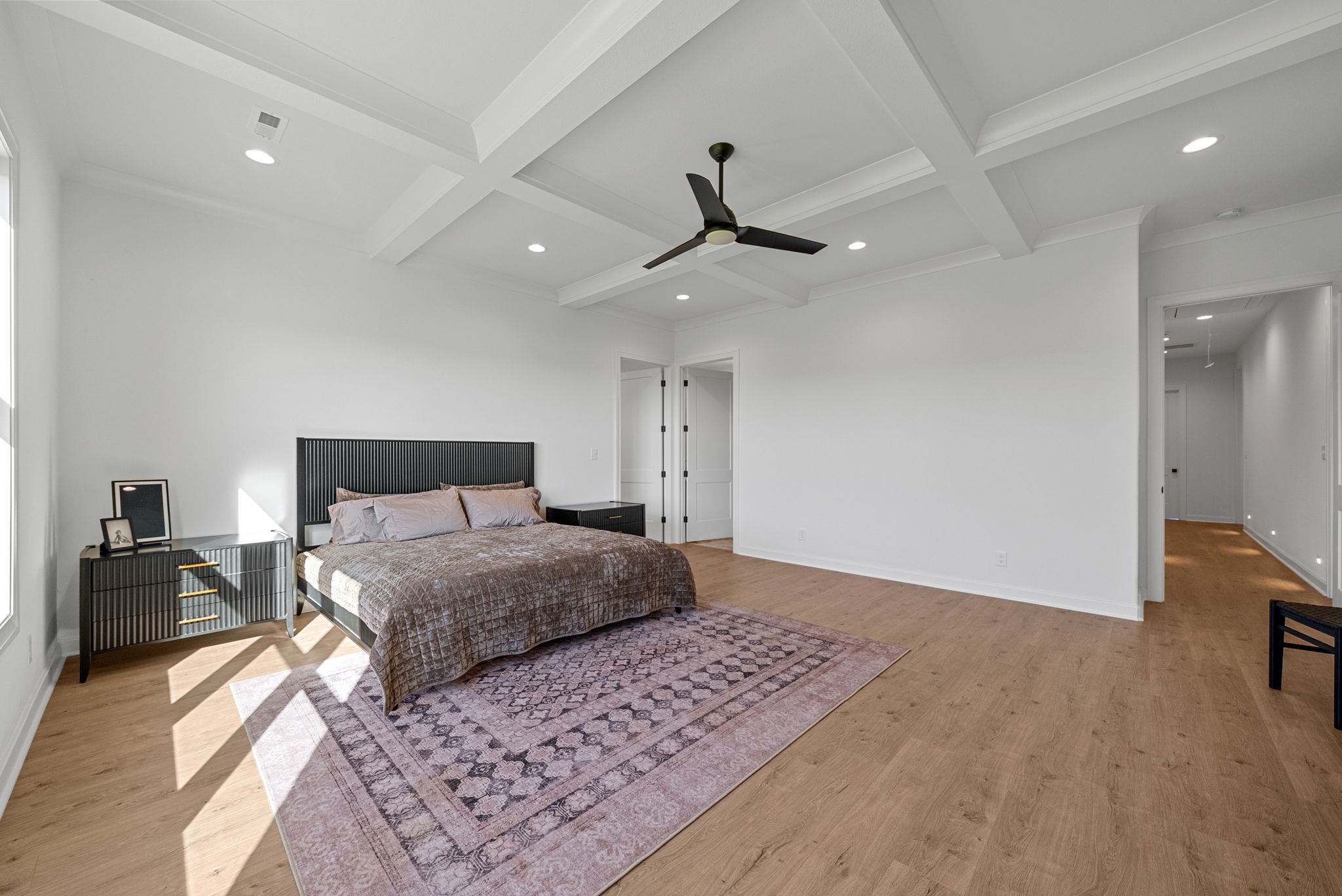 1914 Hickory Point Road Clarksville, TN 37043 - Photo 21 of 38 a bedroom with a large bed and a chandelier