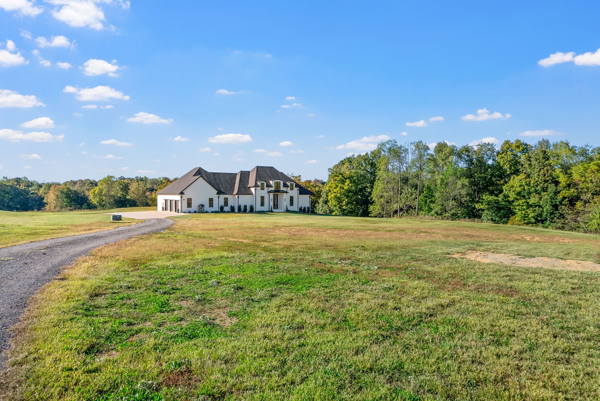 1914 Hickory Point Road Clarksville, TN 37043 - Photo 5 of 38 a view of a garden with a building in the background