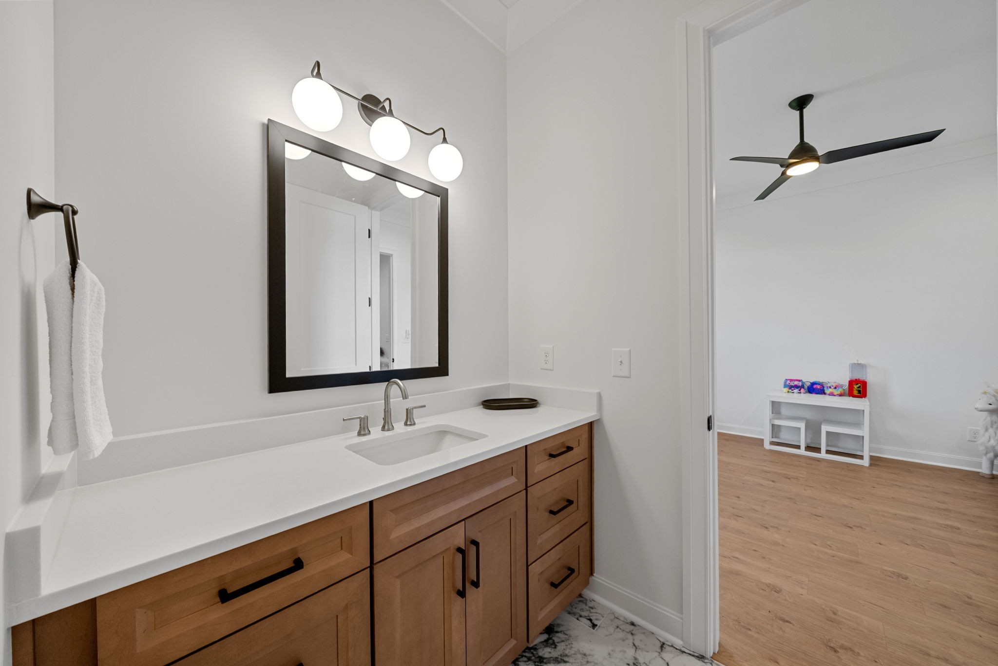 1914 Hickory Point Road Clarksville, TN 37043 - Photo 58 of 75 a bathroom with a sink and a mirror