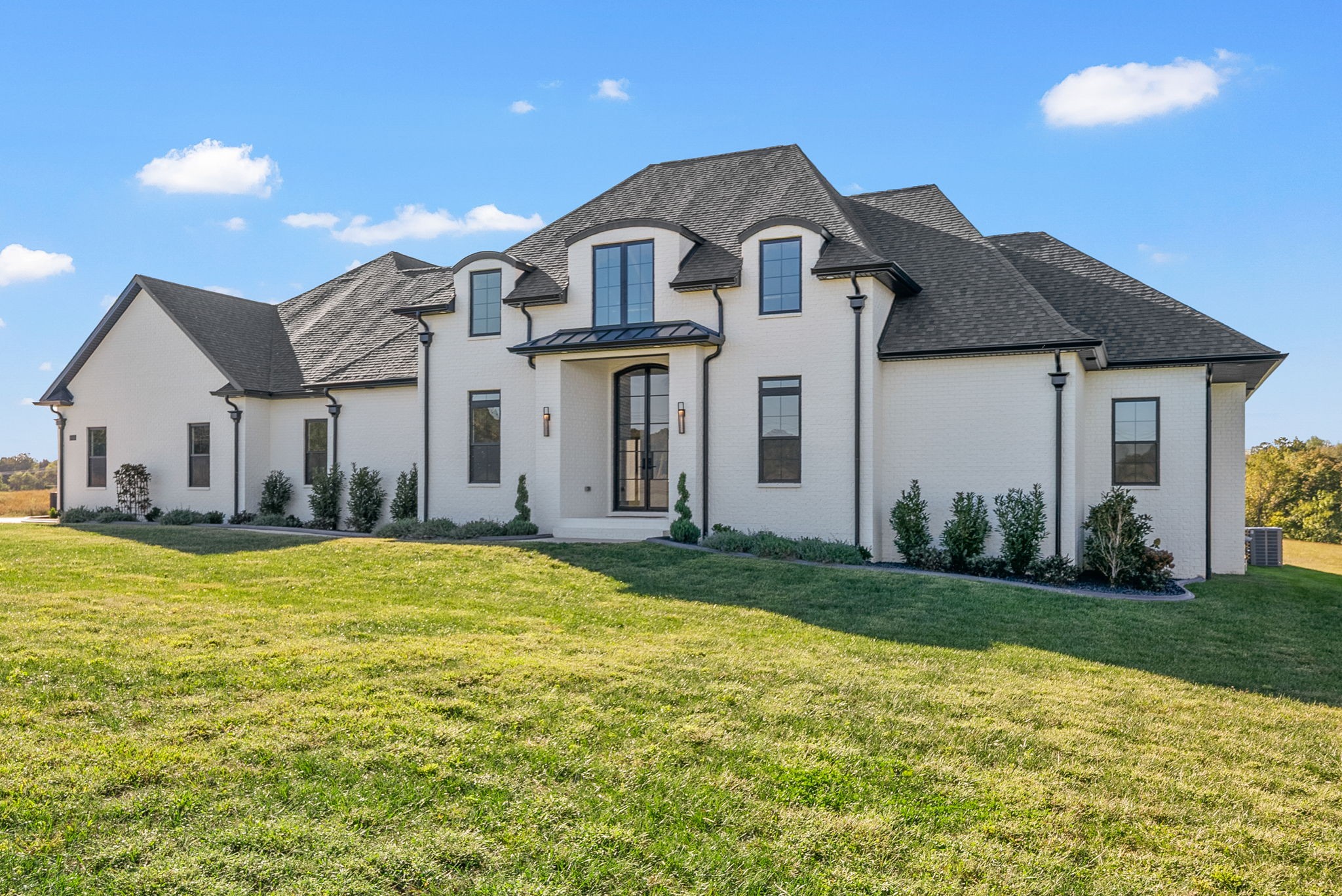 1914 Hickory Point Road Clarksville, TN 37043 - Photo 6 of 38 a front view of a house with a garden