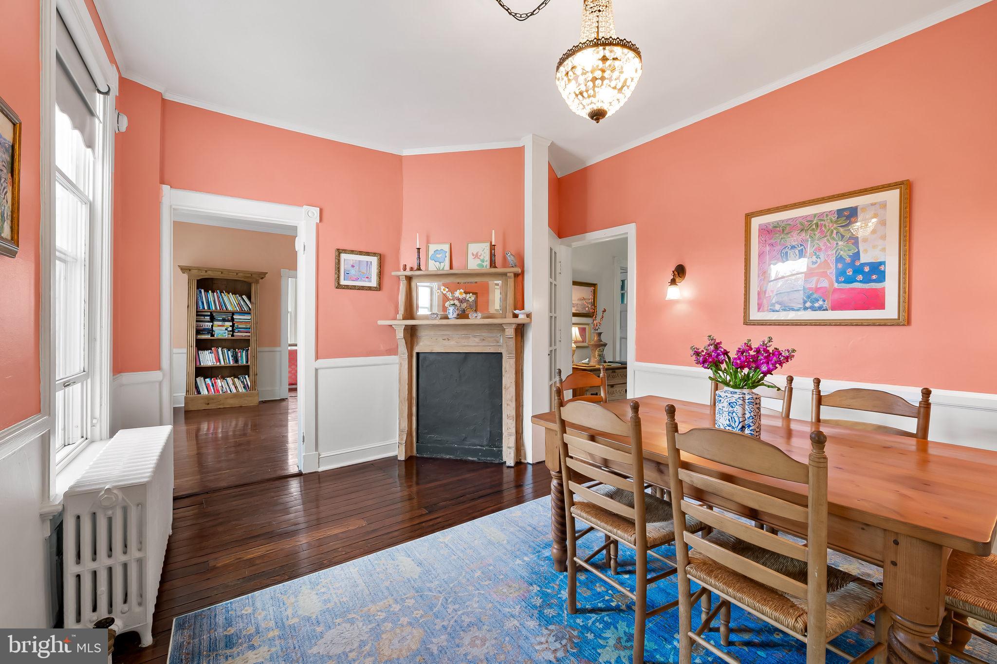 1018 Windsor Road Baltimore, MD 21208 - Photo 17 of 50 a view of a dining room with furniture and wooden floor