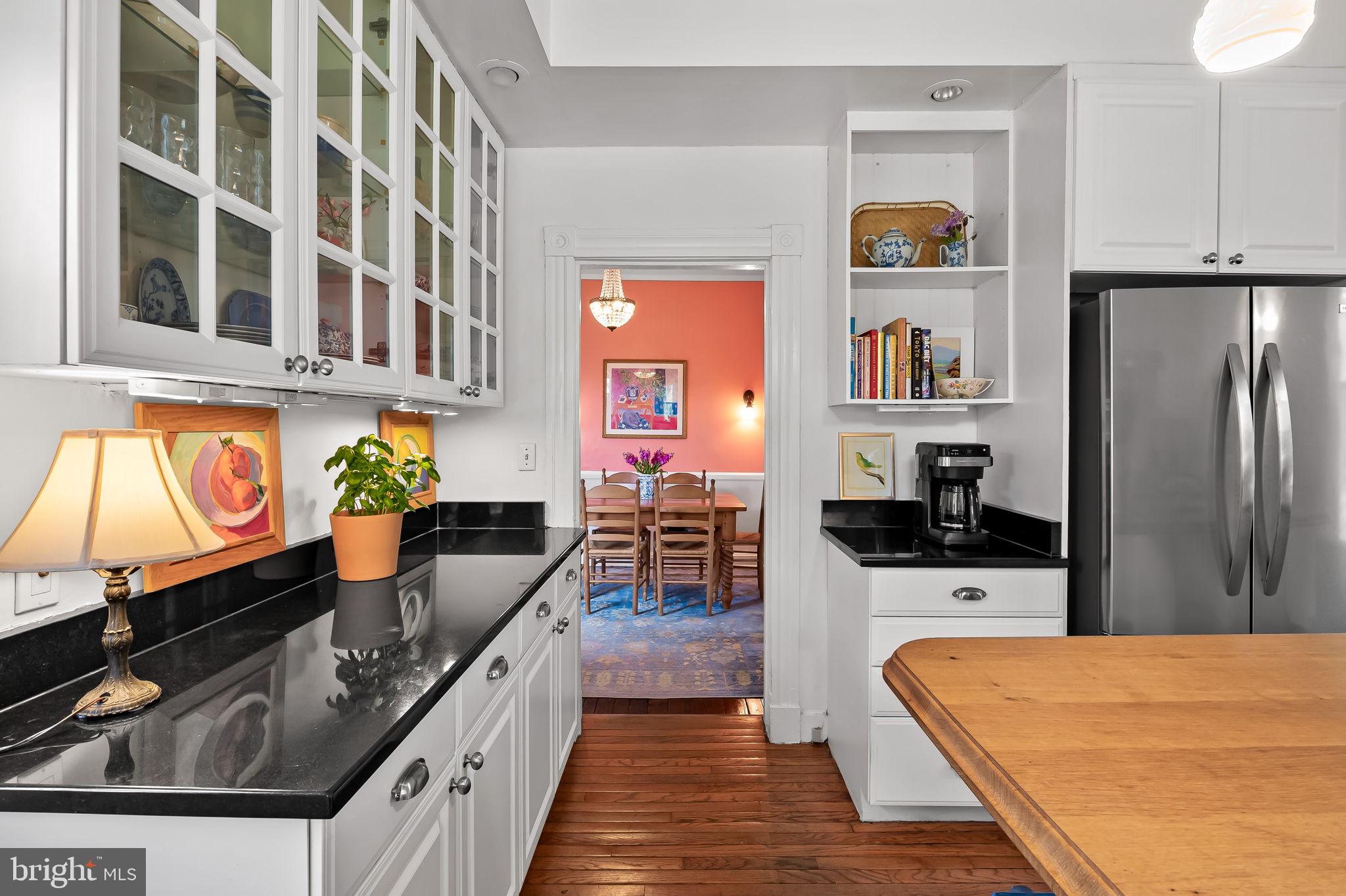 1018 Windsor Road Baltimore, MD 21208 - Photo 20 of 50 a kitchen with stainless steel appliances granite countertop a stove and a refrigerator