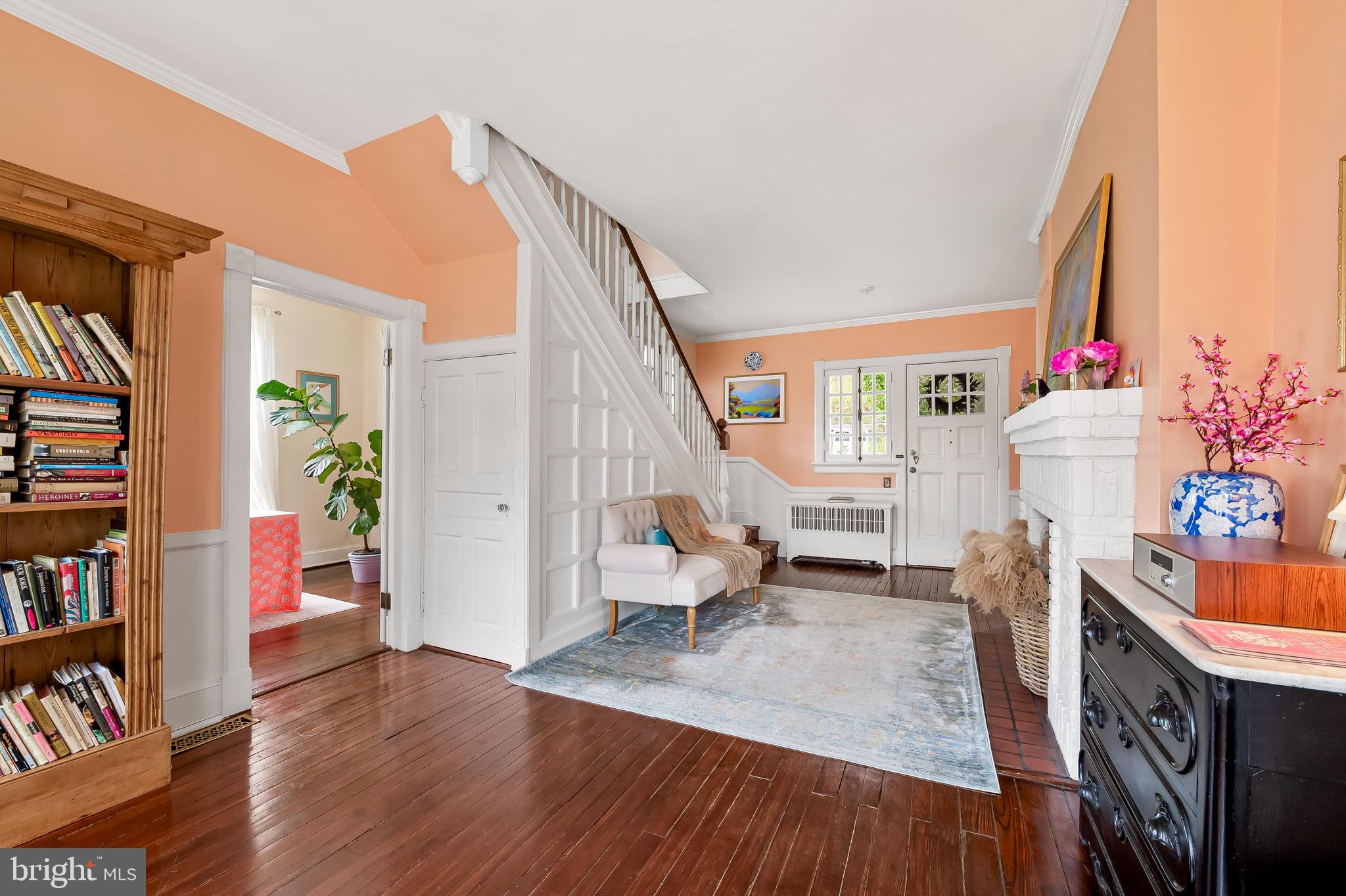 1018 Windsor Road Baltimore, MD 21208 - Photo 24 of 50 a living room with furniture and a potted plant