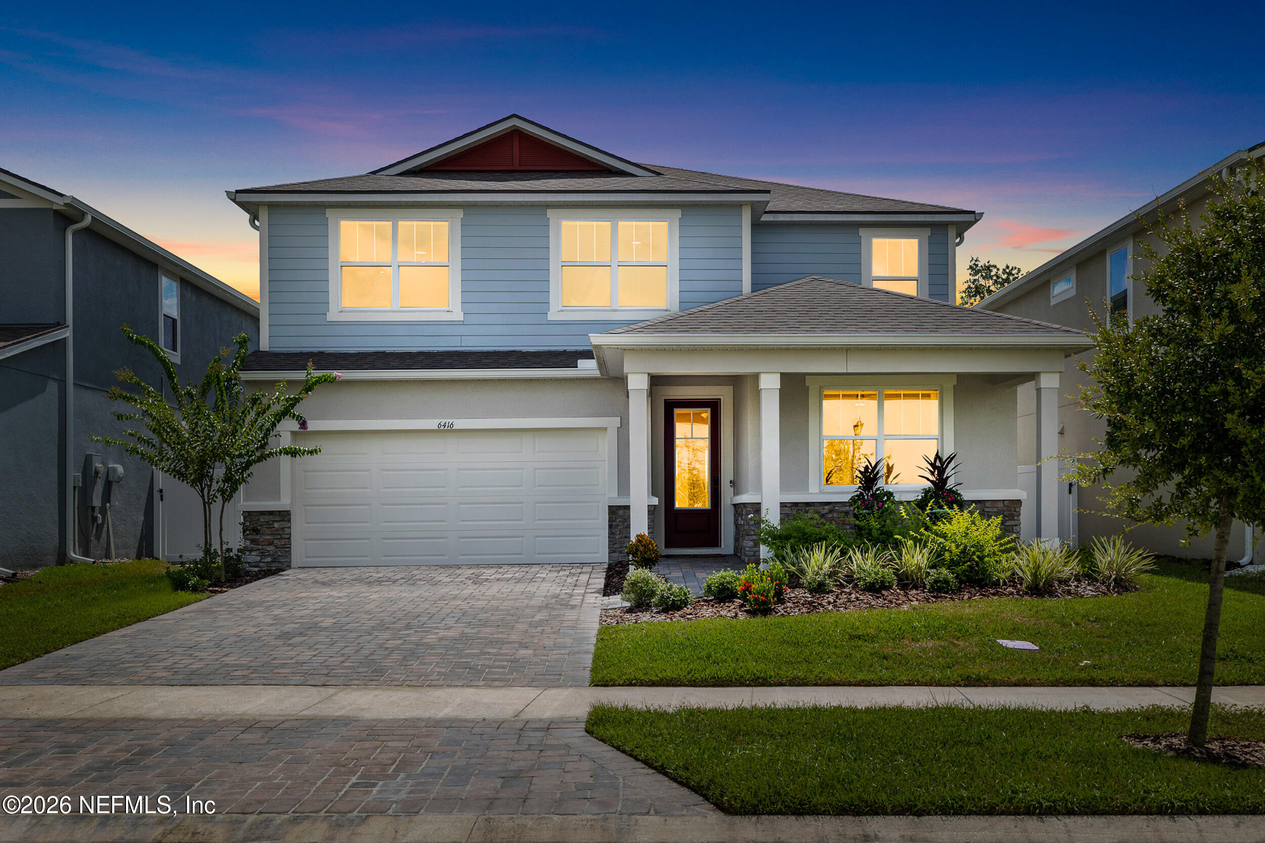 6416 Timberdale Avenue Wesley Chapel, FL 33545 - Photo 1 of 44 Exterior Front Twilight