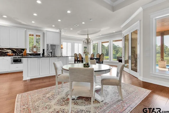 a view of a dining room with furniture
