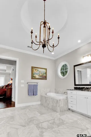 a view of a hallway with seating area