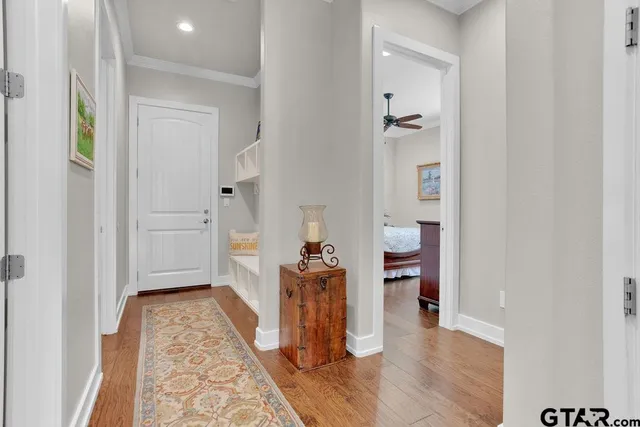 wooden floor in a hall with an entryway
