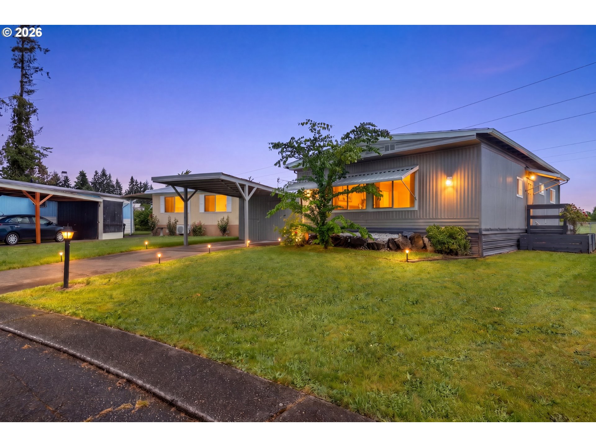 205 South 54th Street, Unit 20 Springfield, OR 97478 - Photo 1 of 32 a swimming pool with yard