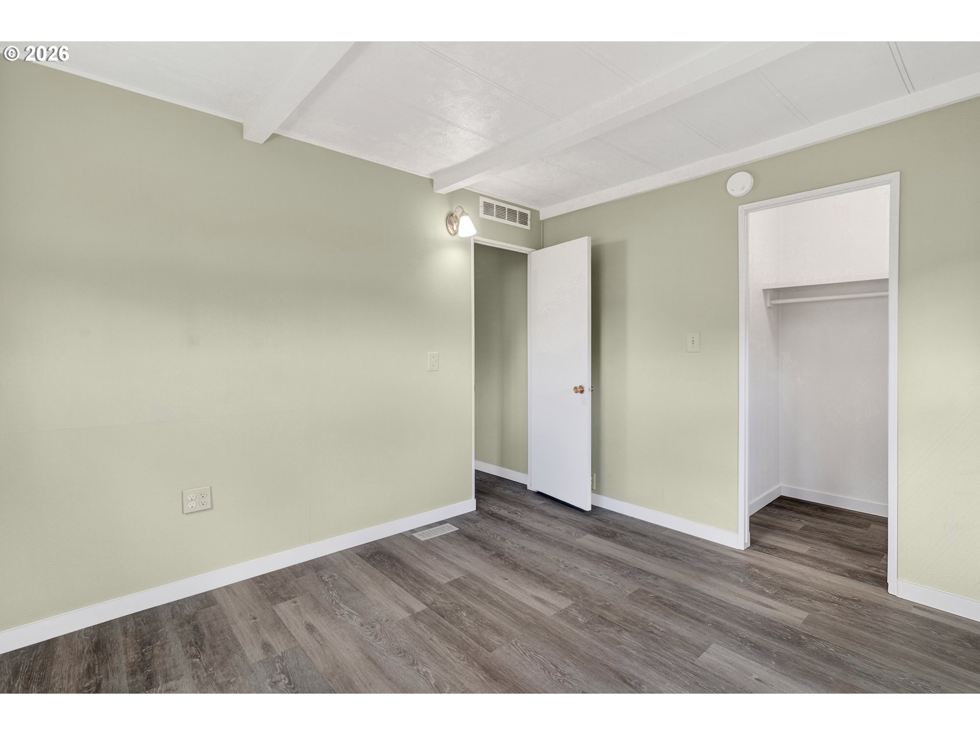 205 South 54th Street, Unit 20 Springfield, OR 97478 - Photo 21 of 32 a view of an empty room with wooden floor