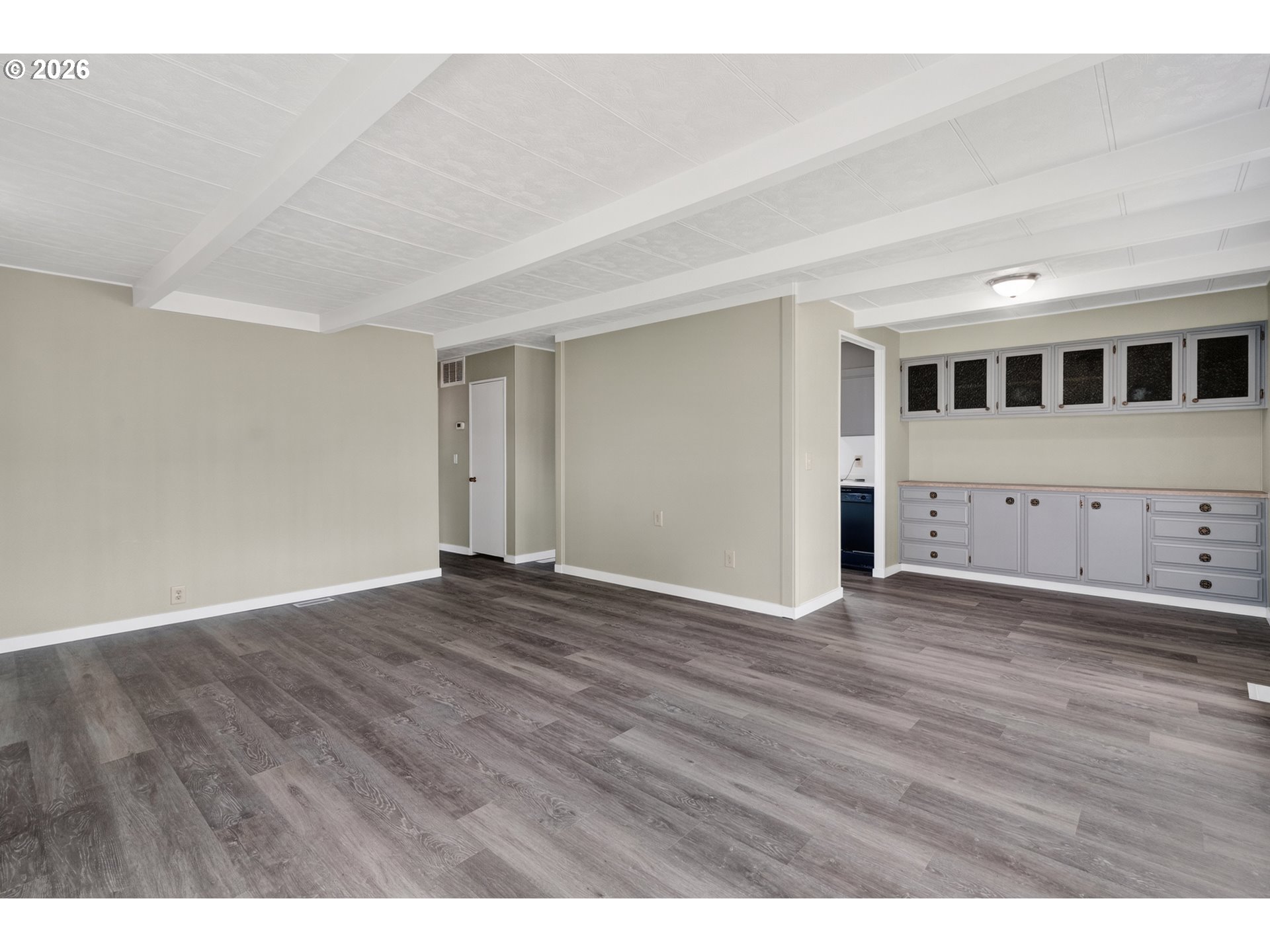 205 South 54th Street, Unit 20 Springfield, OR 97478 - Photo 6 of 32 a view of an empty room with wooden floor