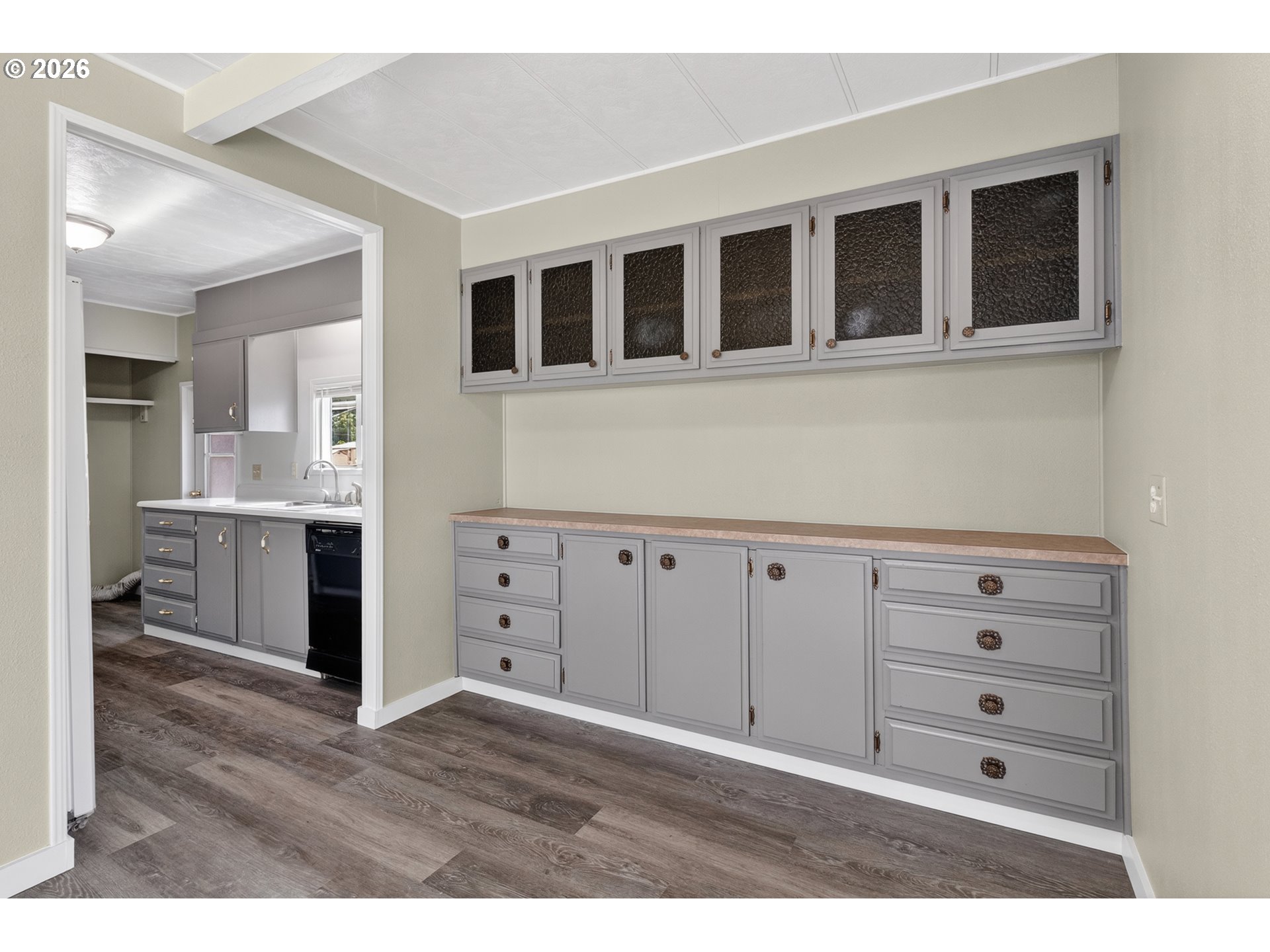 205 South 54th Street, Unit 20 Springfield, OR 97478 - Photo 7 of 32 a view of an empty room with a kitchen