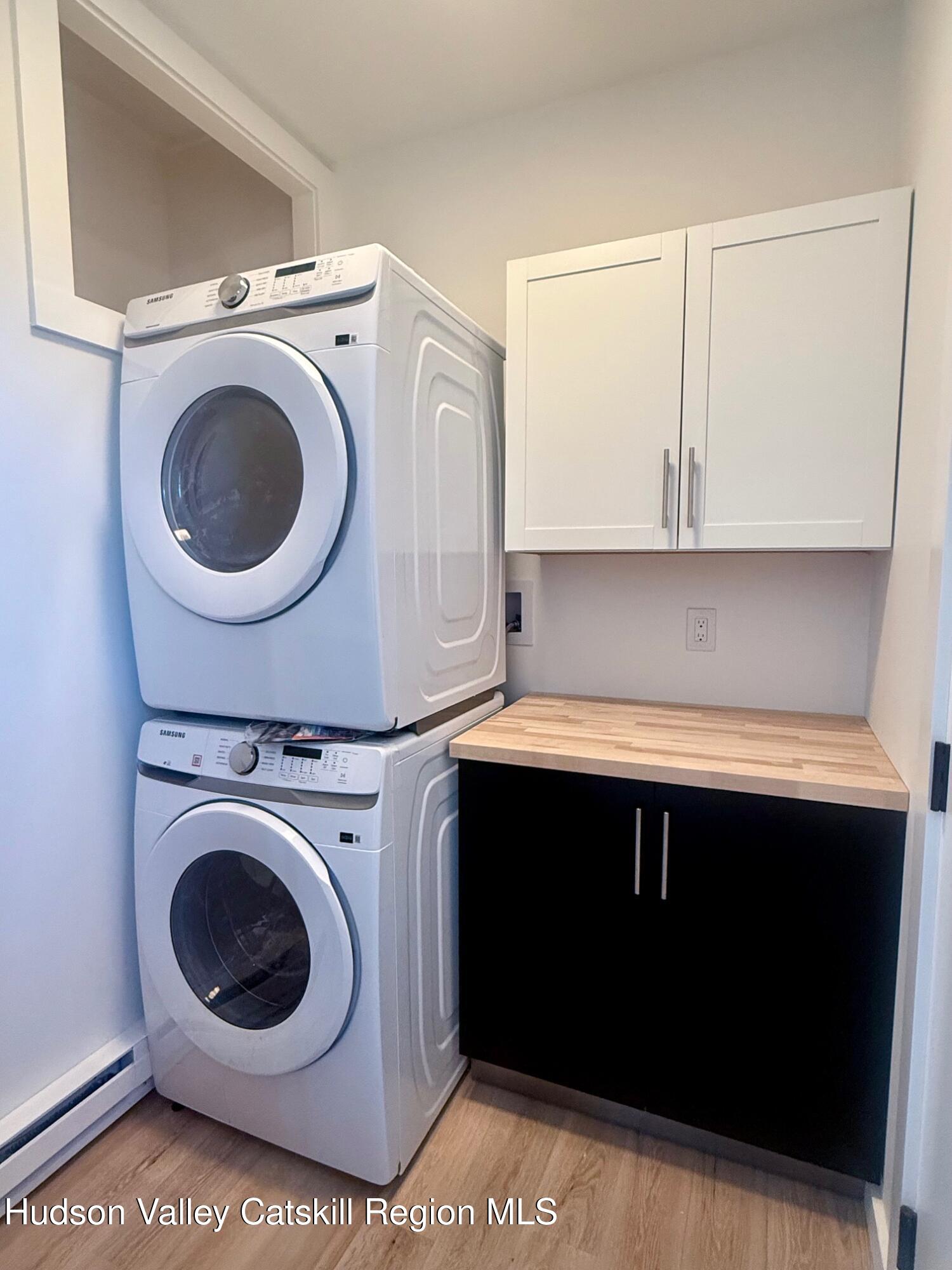 1 Main Street, Unit 2 Kingston, NY 12401 - Photo 13 of 14 a utility room with dryer and washer