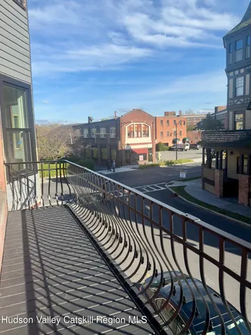a view of a balcony with city view