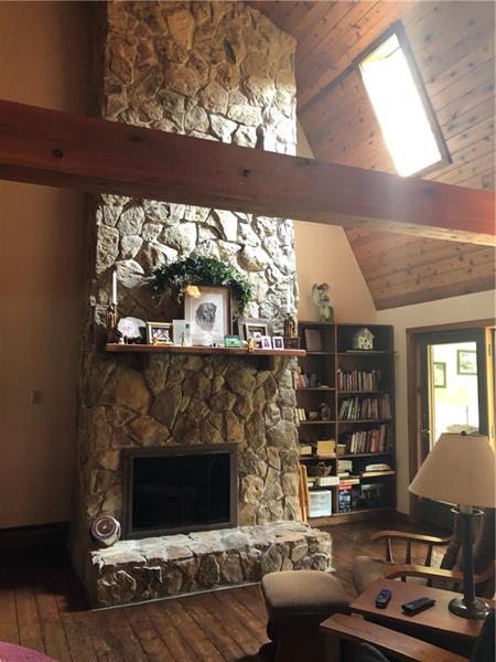 141 Cartwright Road Chicora, PA 16025 - Photo 8 of 25 The souring fireplace is the focal point of the living area from the main level and the loft!