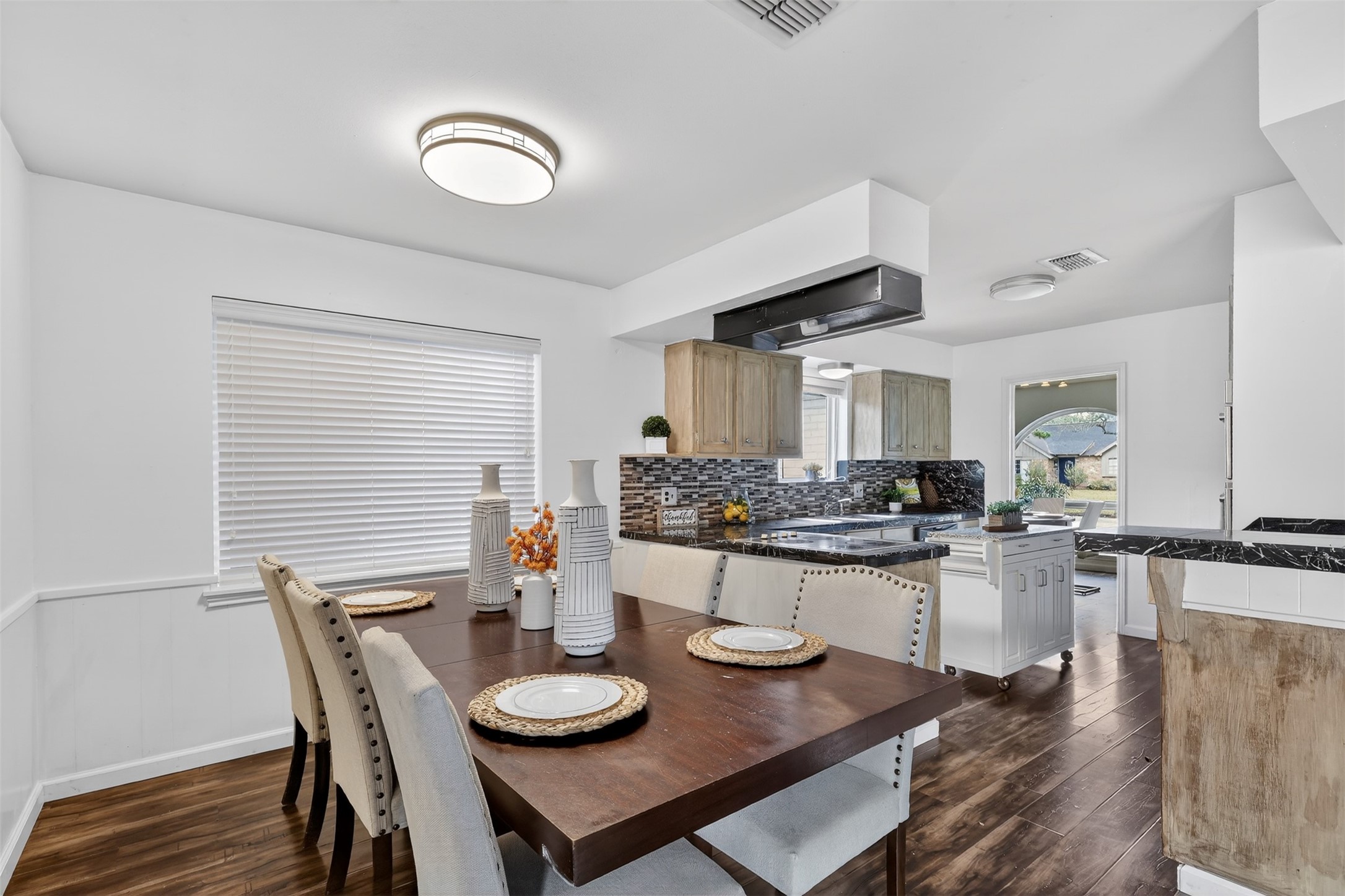 2519 Anniston Drive Houston, TX 77080 - Photo 13 of 39 a view of a dining room with furniture and wooden floor