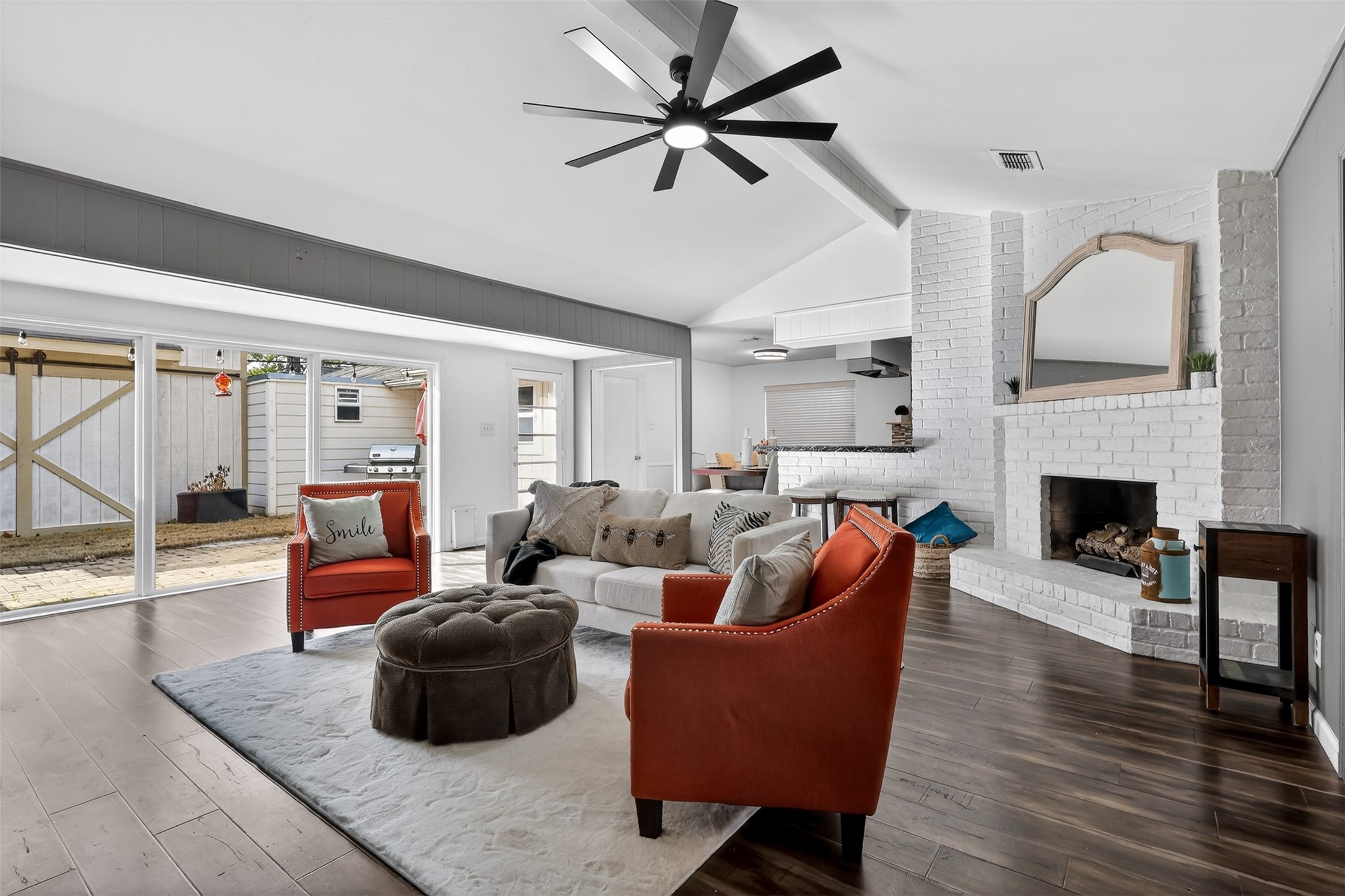 2519 Anniston Drive Houston, TX 77080 - Photo 16 of 39 a living room with furniture and a fireplace