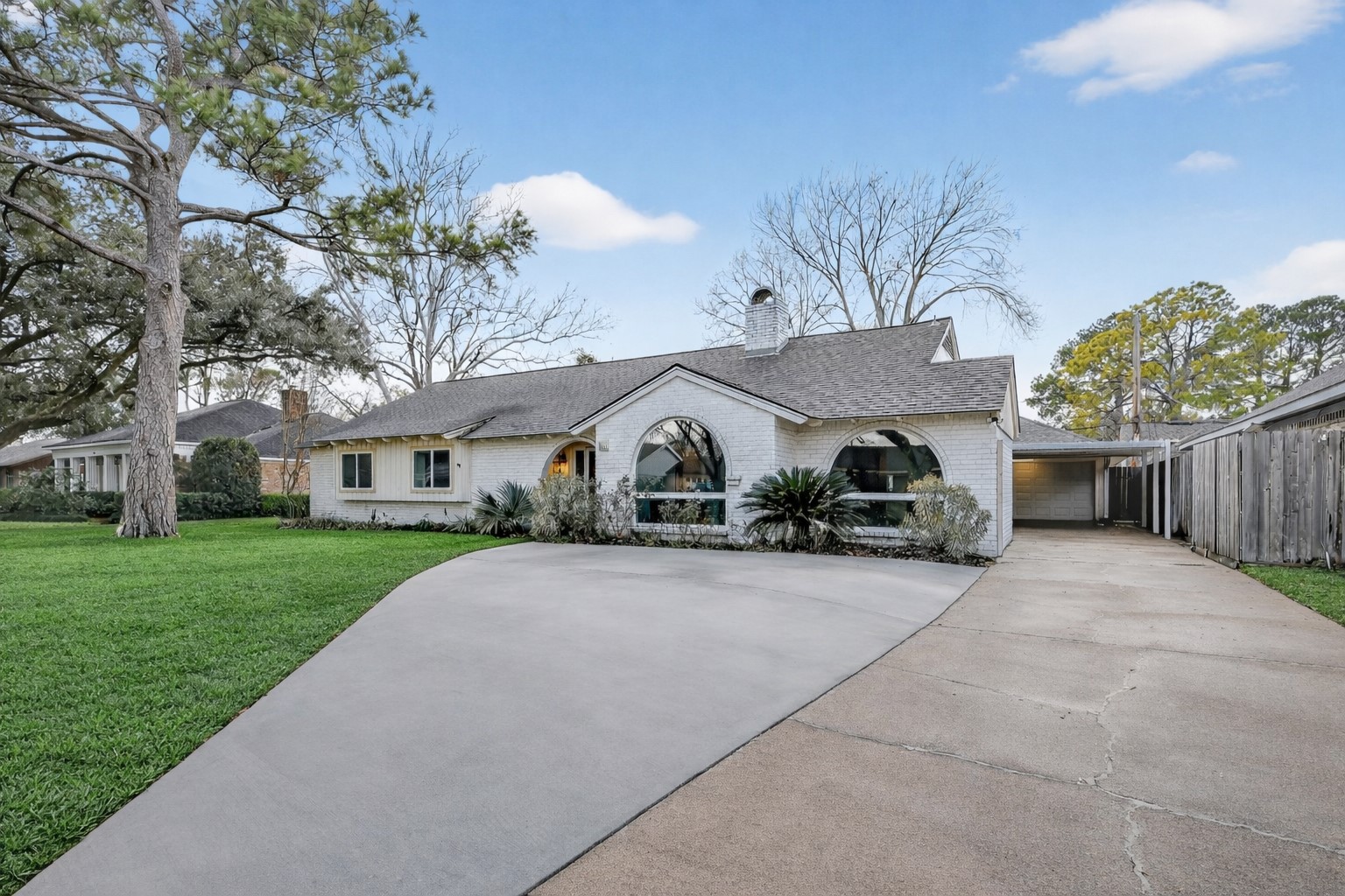 2519 Anniston Drive Houston, TX 77080 - Photo 2 of 39 a front view of a house with garden