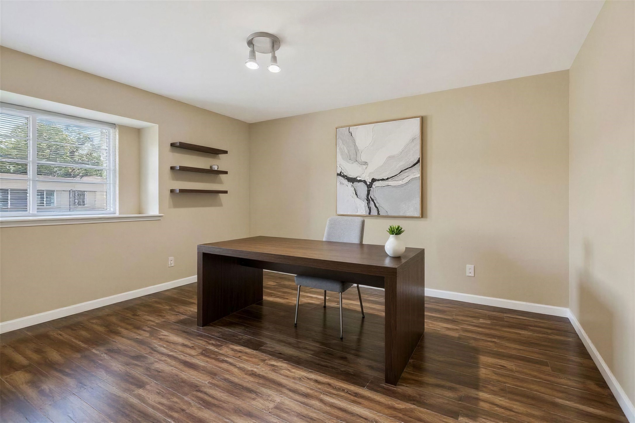 2519 Anniston Drive Houston, TX 77080 - Photo 24 of 39 a living room with wooden floor and furniture