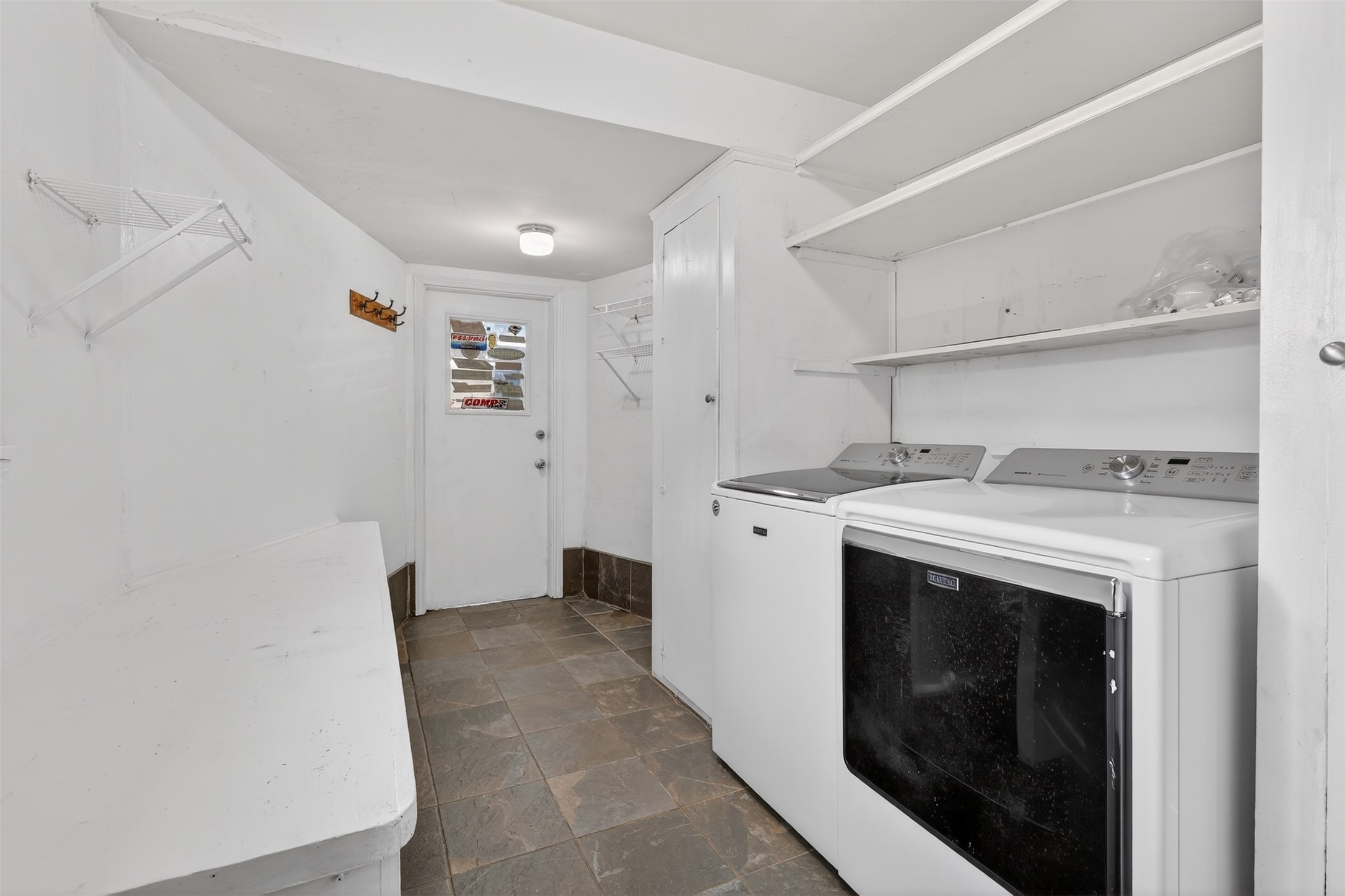 2519 Anniston Drive Houston, TX 77080 - Photo 28 of 39 a utility room with dryer and washer