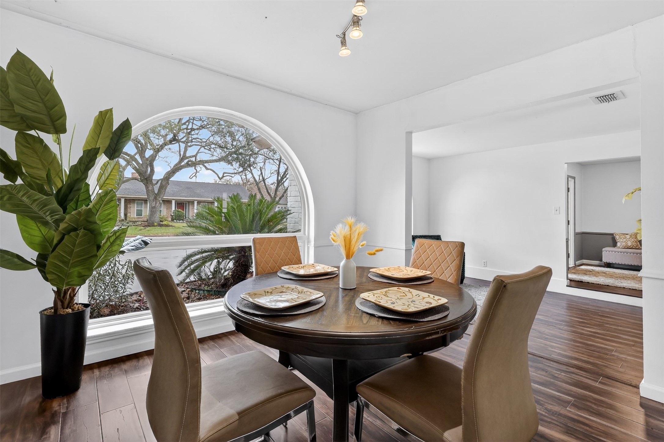 2519 Anniston Drive Houston, TX 77080 - Photo 6 of 39 a view of a dining room with furniture window and wooden floor