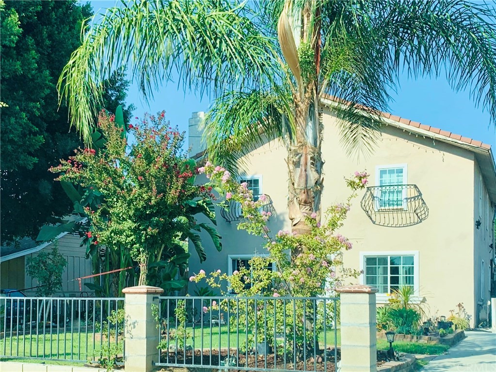 3469 Hoover Street Riverside, CA 92504 - Photo 1 of 1 a view of a sign in a garden