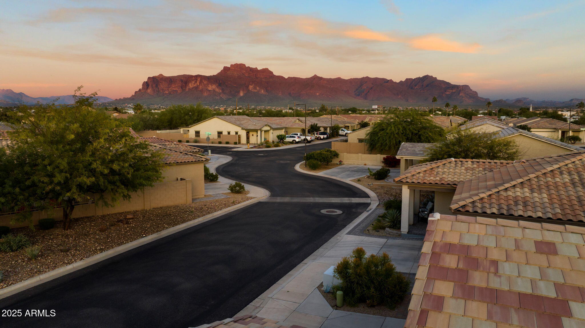 1755 East Mesquite Avenue Apache Junction, AZ 85119 - Photo 3 of 17 a view of a terrace with a garden