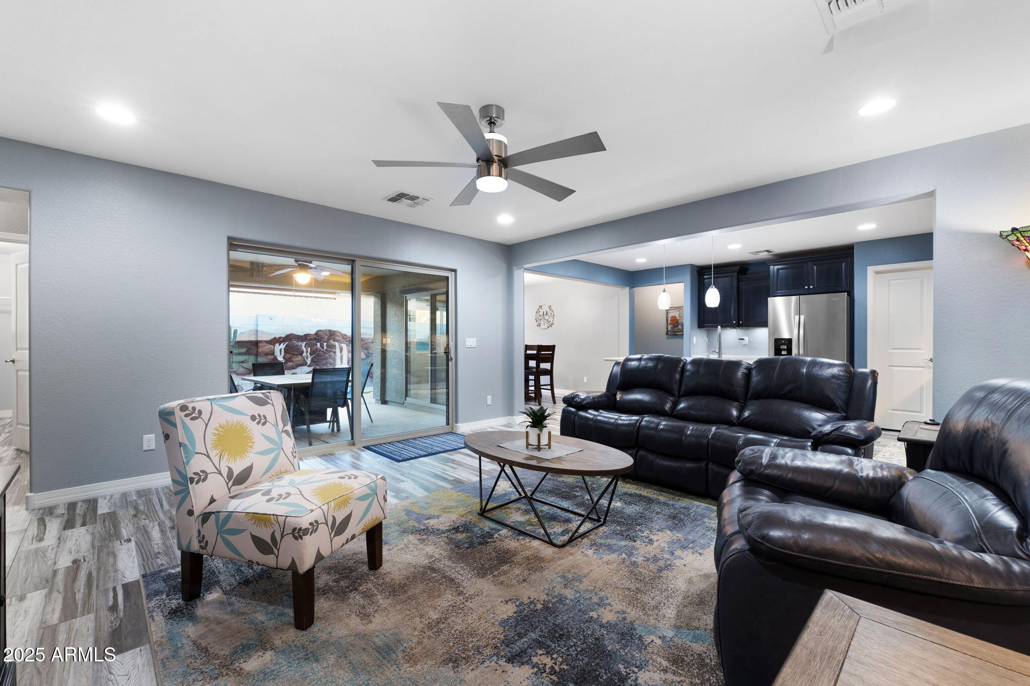 1755 East Mesquite Avenue Apache Junction, AZ 85119 - Photo 7 of 17 a living room with furniture and a large window