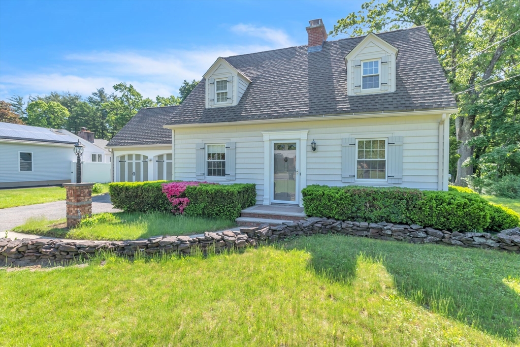 1271 Plumtree Road Springfield, MA 01119 - Photo 1 of 41 a front view of a house with a yard and potted plants