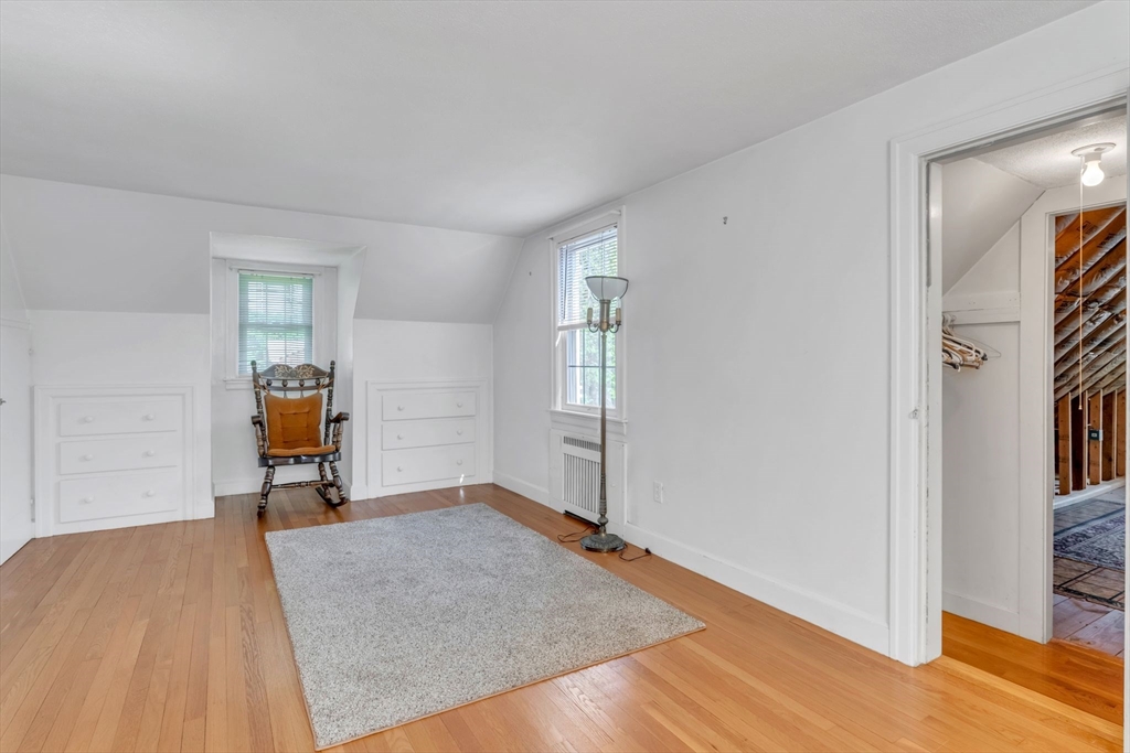 1271 Plumtree Road Springfield, MA 01119 - Photo 19 of 41 a view of a livingroom with wooden floor and a window