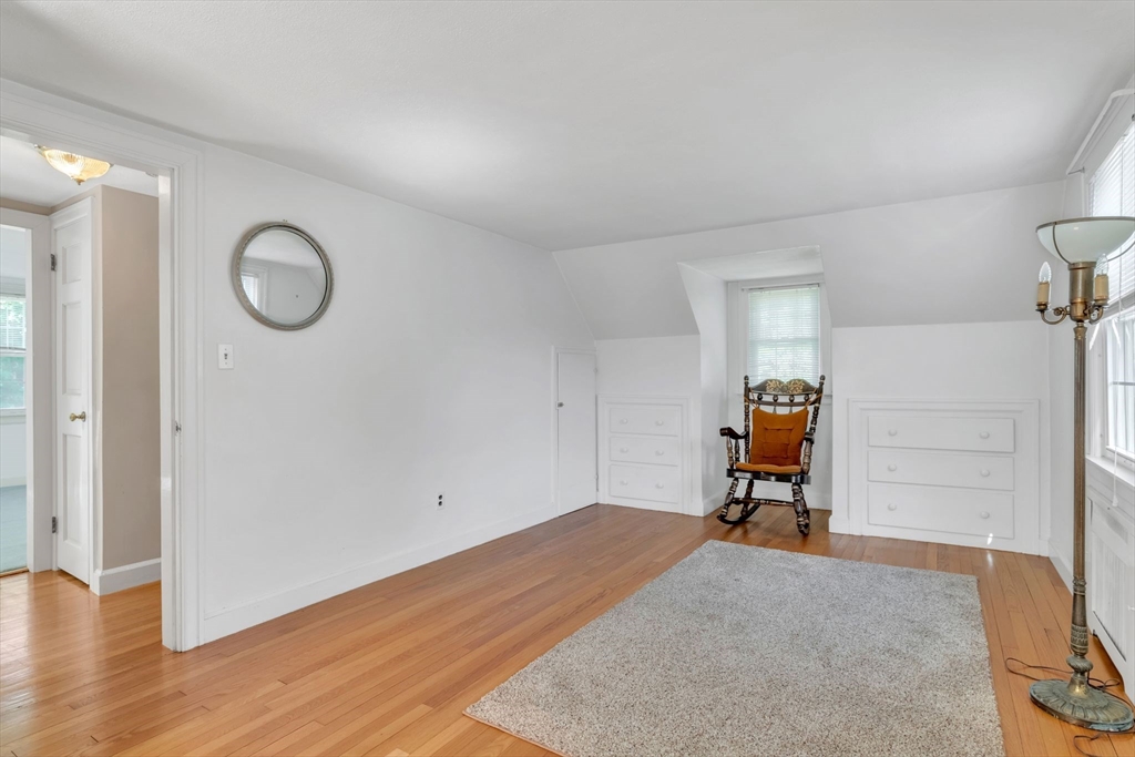 1271 Plumtree Road Springfield, MA 01119 - Photo 20 of 41 a view of a room with wooden floor and furniture