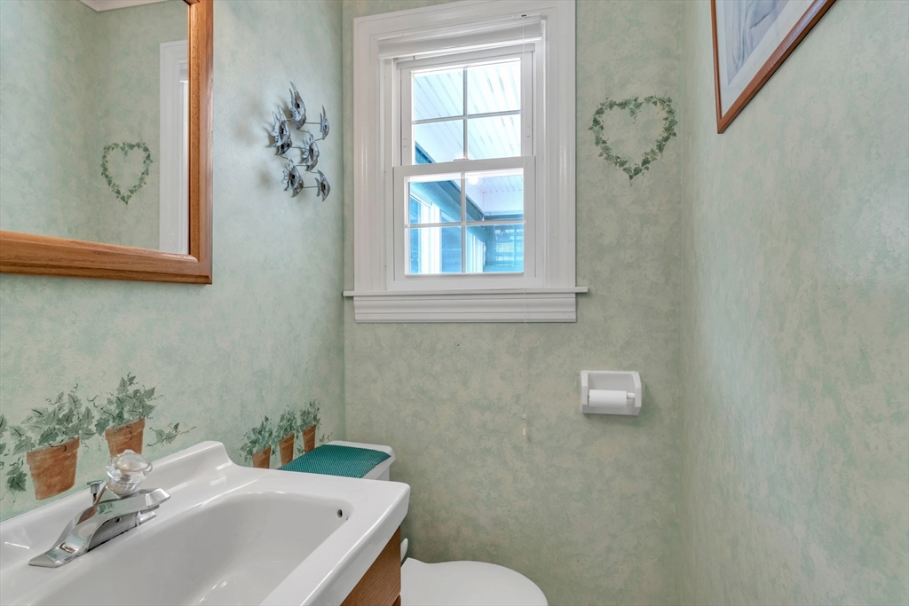 1271 Plumtree Road Springfield, MA 01119 - Photo 22 of 41 a bathroom with a sink and mirror with toilet